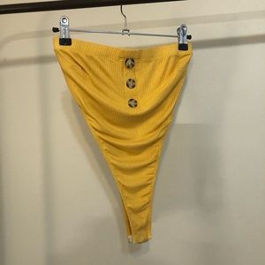 Yellow high waisted strapless bodysuit